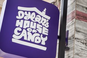 Dylan's House of Candy shop purple illuminated sign