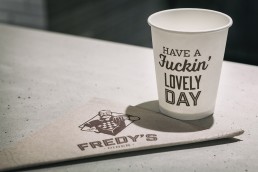 A takeaway cup and napkin at Fredy's Diner